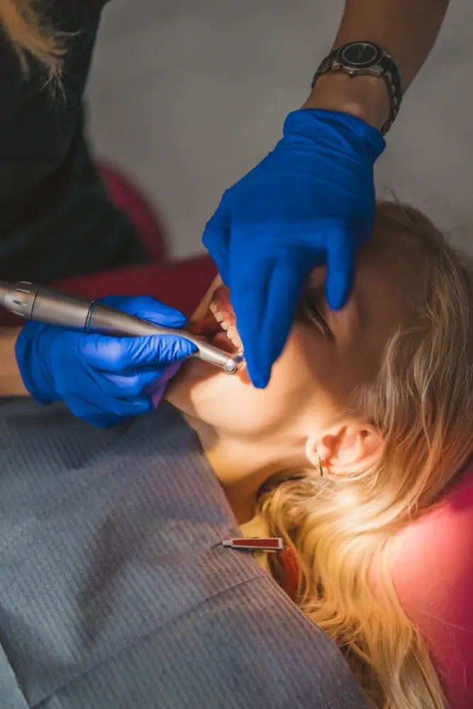 Foundation Dental Services specialist periodontist checking the patient teeth