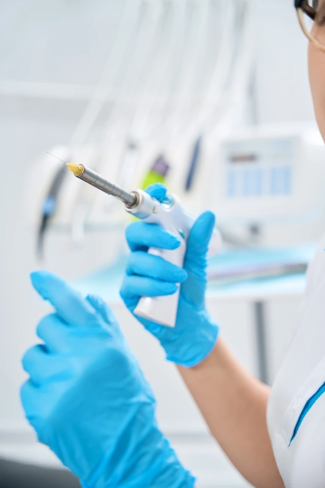 Foundation Dental Services Endodontist going to disinfect and fill the tooth roots